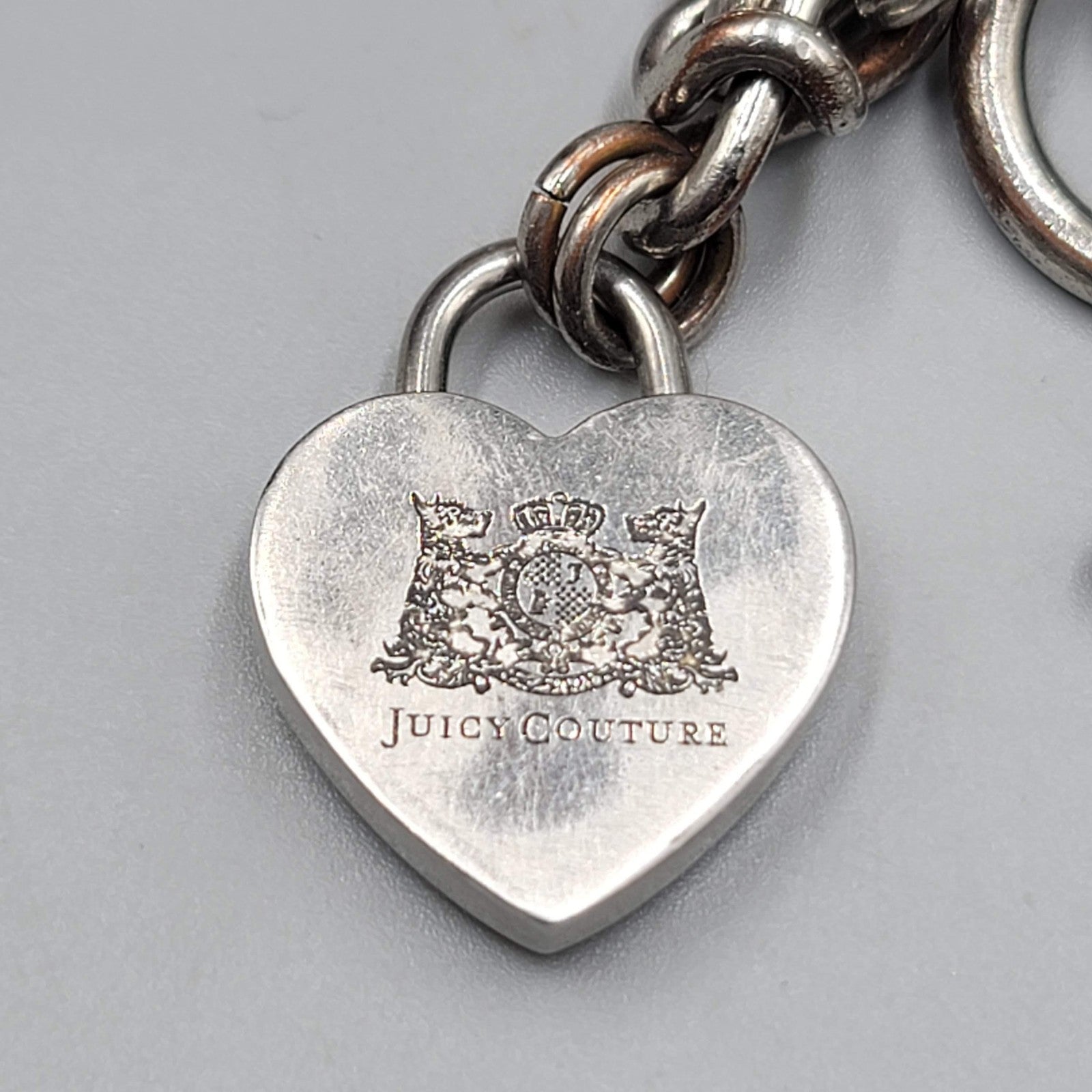 Juicy Couture Charm Bracelet Silver Tone Heart Lock Sneaker Glasses Cocktail 6"