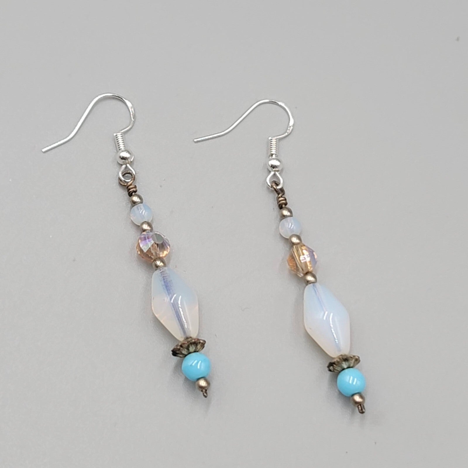 Sterling Silver Pierced Earrings Blue Iridescent Bead Dangle 1.75"
