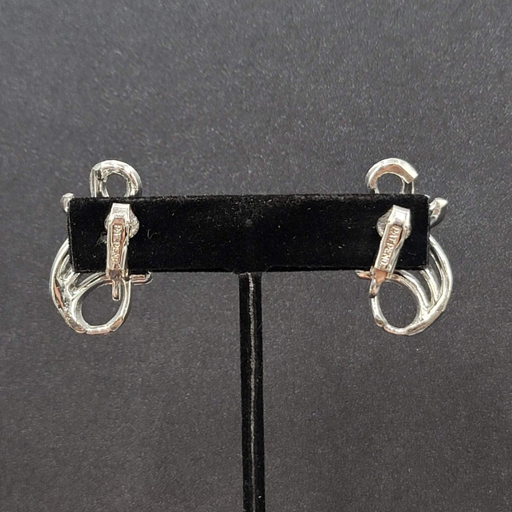 Vintage Clip on Earrings Pat Pend Silver tone Swirl Climber 1.25"