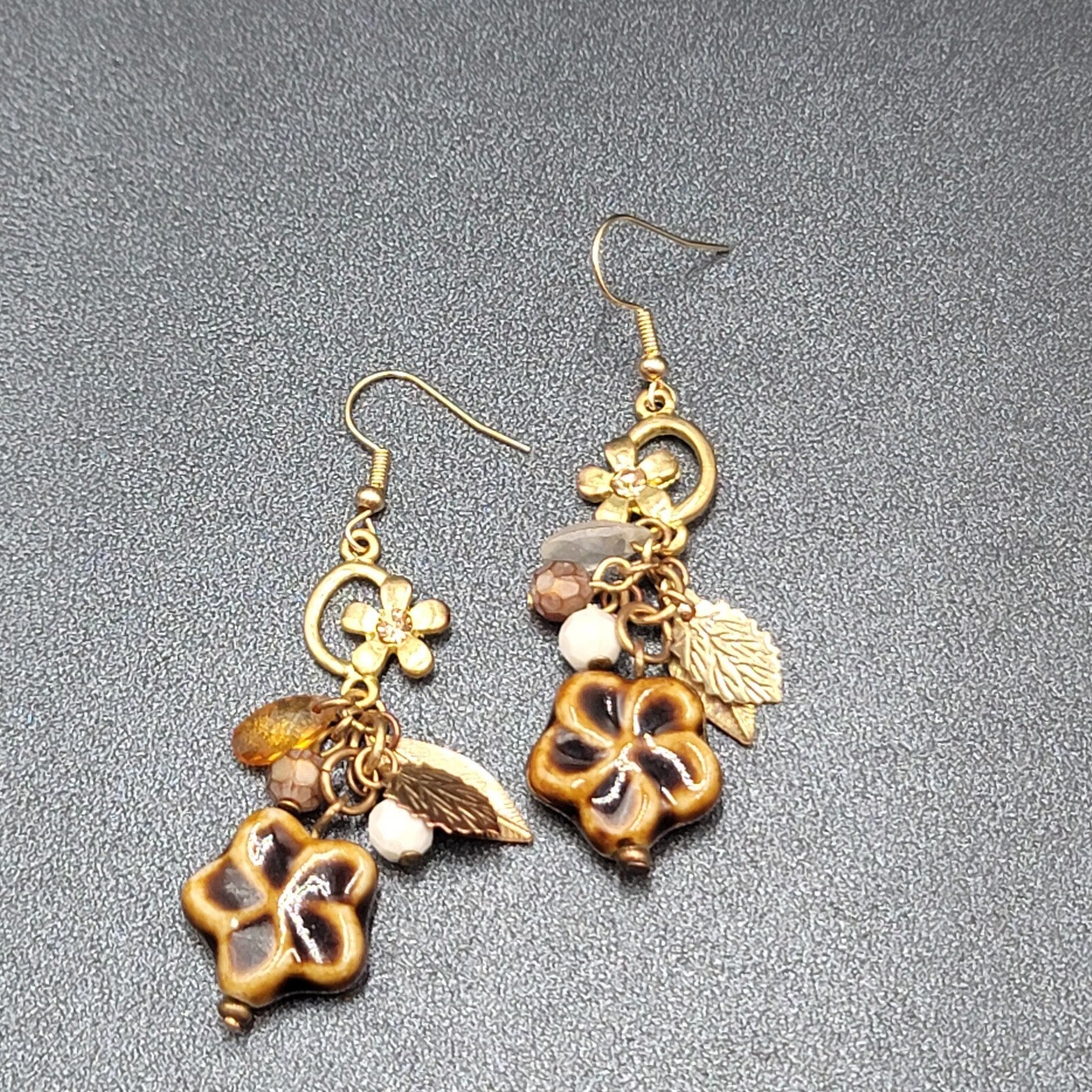 Pierced Earrings Gold tone Pottery Flower Bead Dangle Leaves 2"