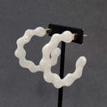 Pierced Earrings Pearloid White Resin Wavy Hoops 2"
