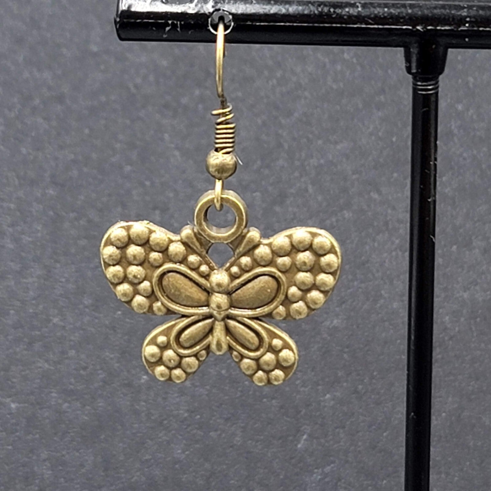 Butterfly Pierced Earrings Dangle Bronze tone Embossed 7/8"