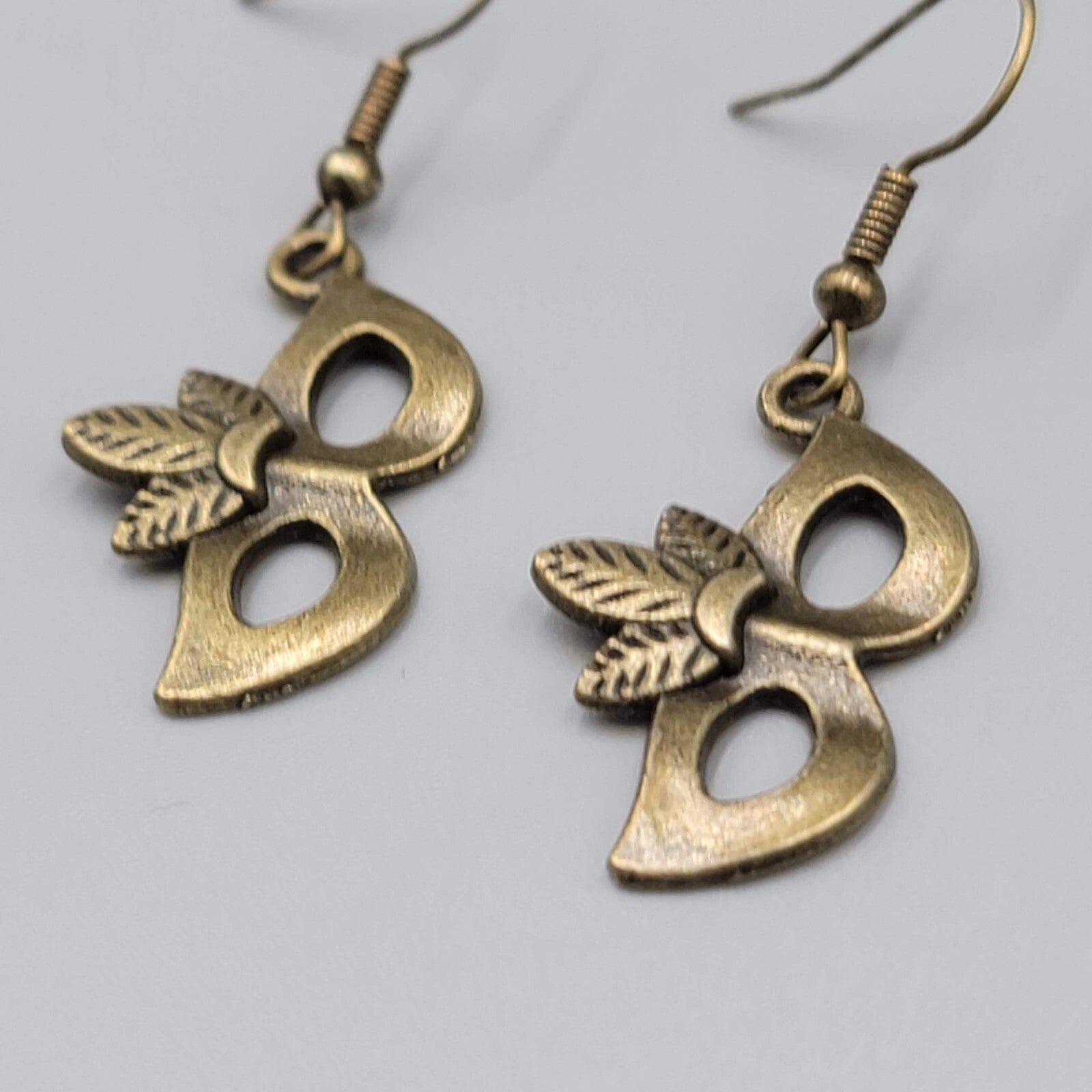 Masquerade Mask Pierced Earrings Bronze tone Metal Embossed Leaves Dangle  1"