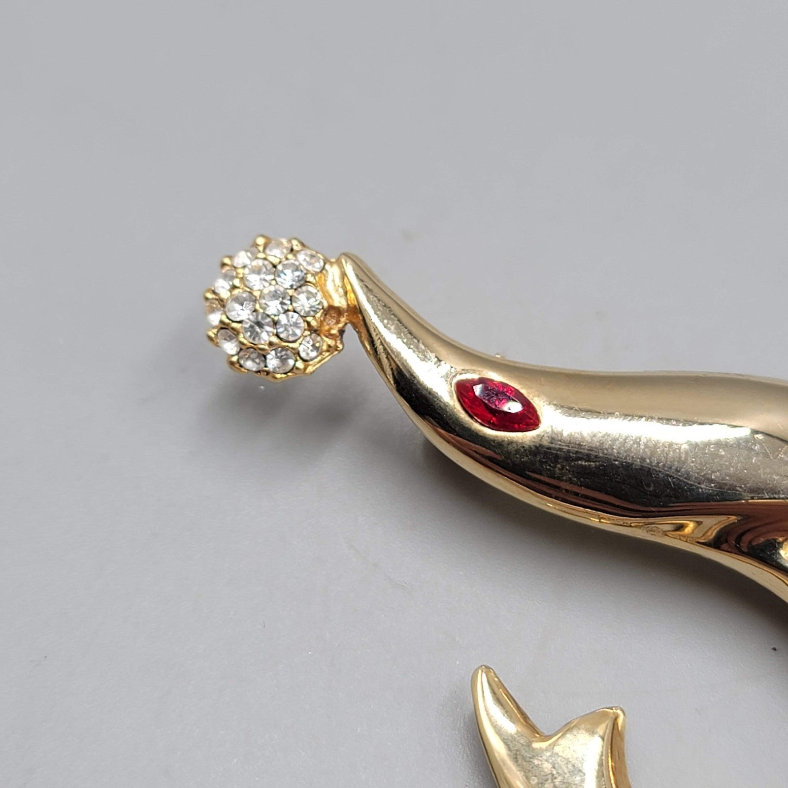 Vintage Seal Red Rhinestone Eye Brooch Gold tone 2.25"