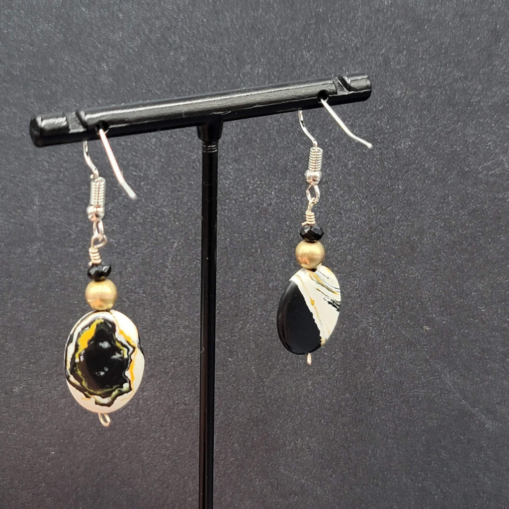 Pierced Earrings Silver tone Black White Yellow Art Glass Oval Bead Dangle 1.25"