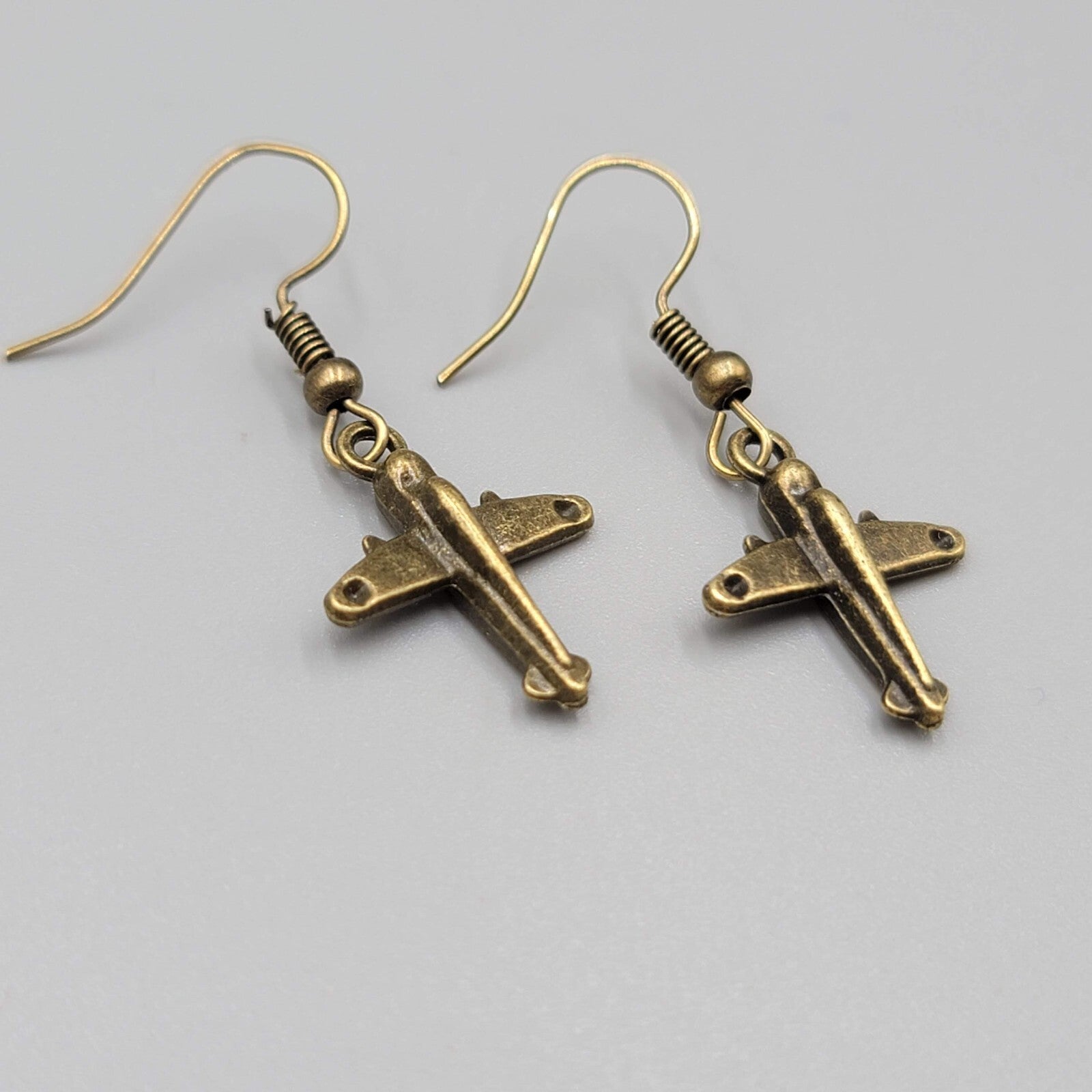 Airplane Pierced Earrings Bronze tone Dangle NEW 3/4"
