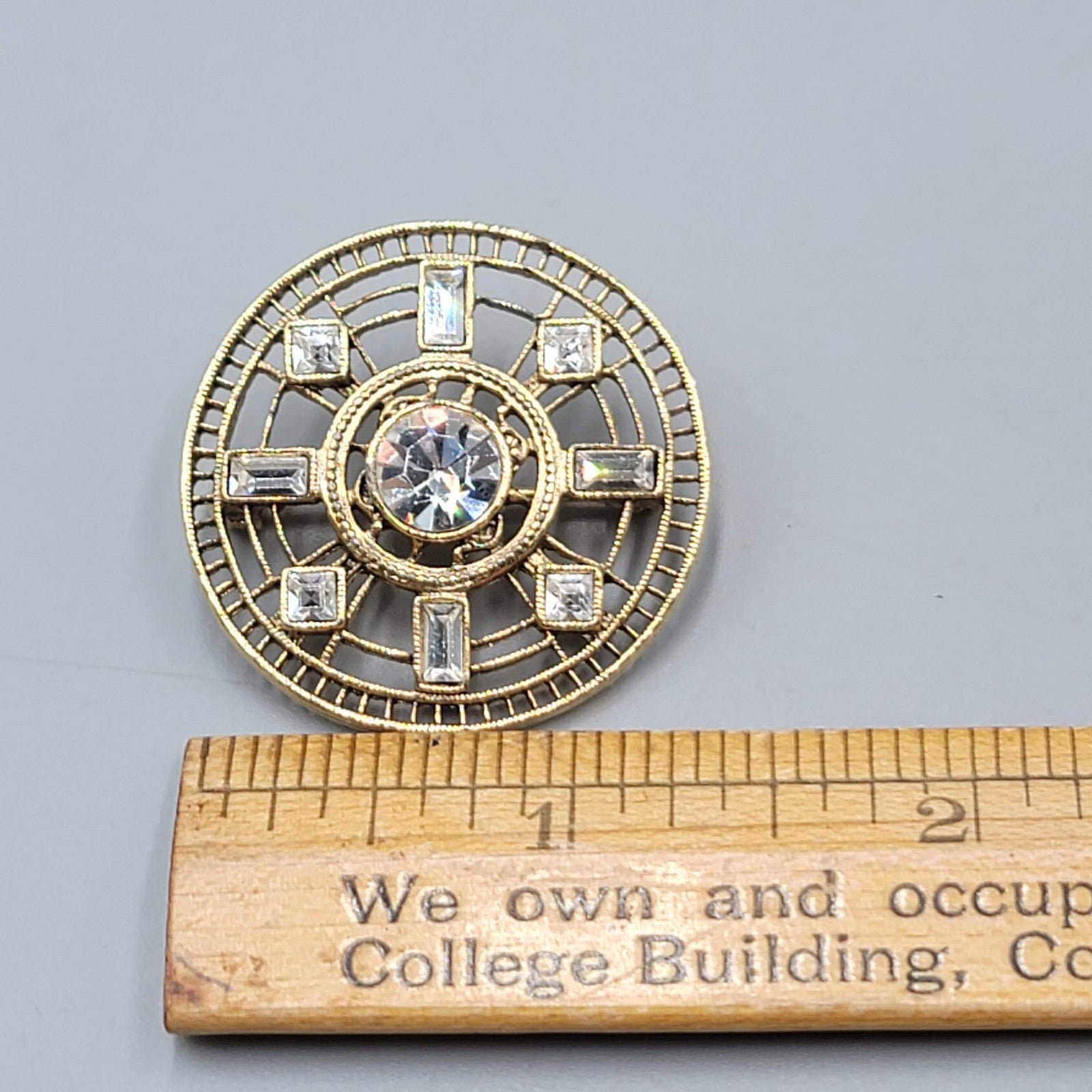 Vintage 1928 Round Open Work Brooch Gold tone Rhinestone 1 3/8 in