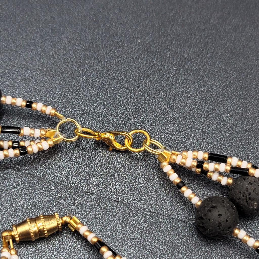 Beaded Necklace Bracelet Earrings Set Gold tone White Black Lava Bead Set