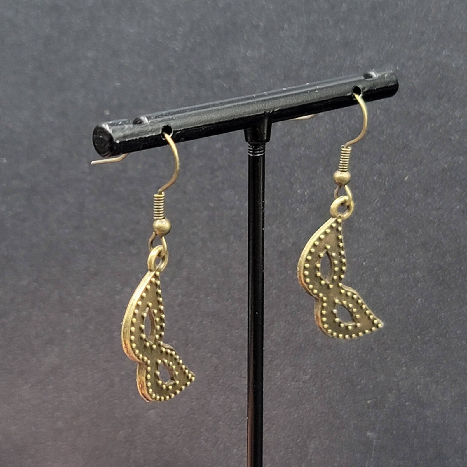 Masquerade Mask Pierced Earrings Bronze tone Metal Embossed Dots Dangle  1"