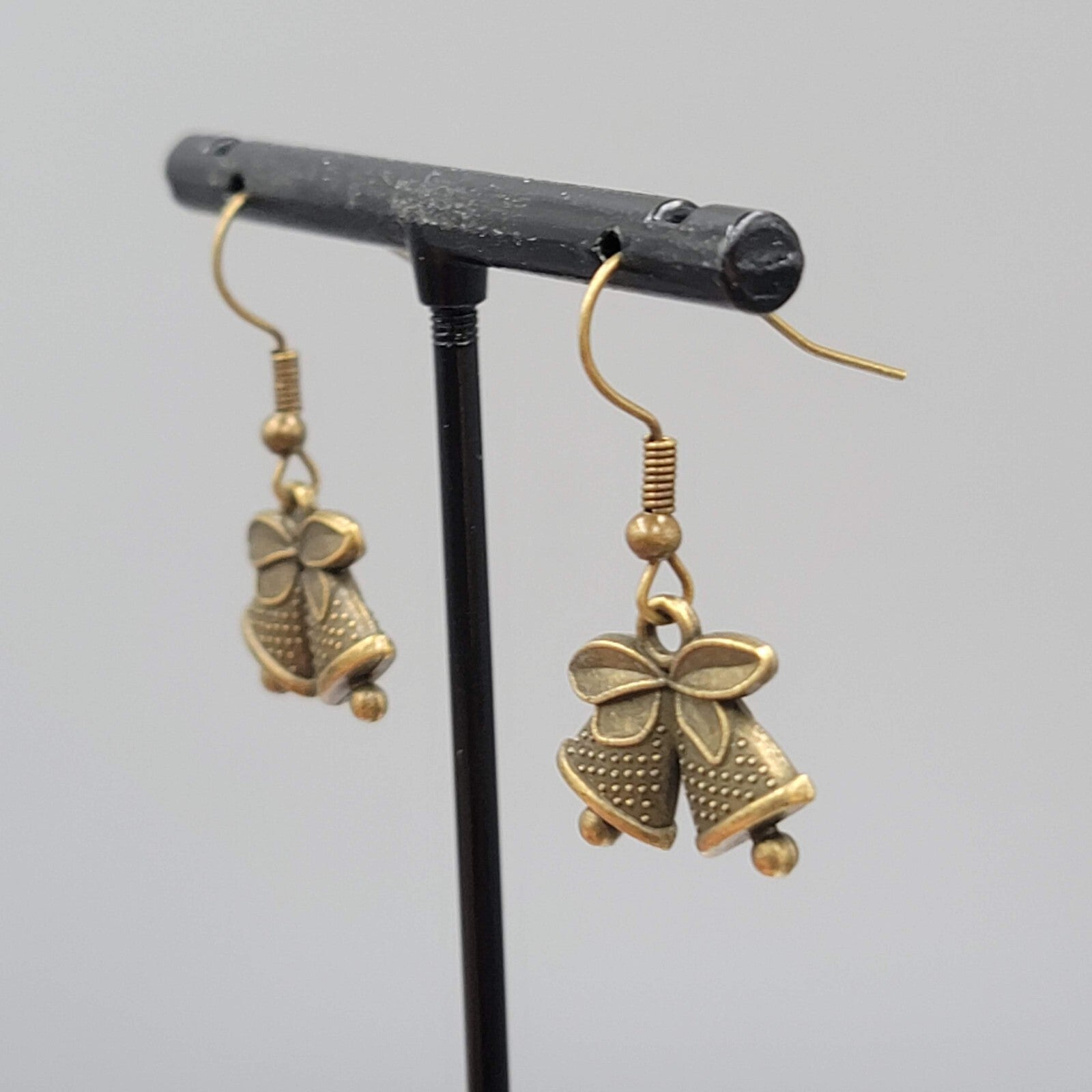 Bronze tone Pierced Earrings  Embossed Bells Holiday Celebration 1/2"