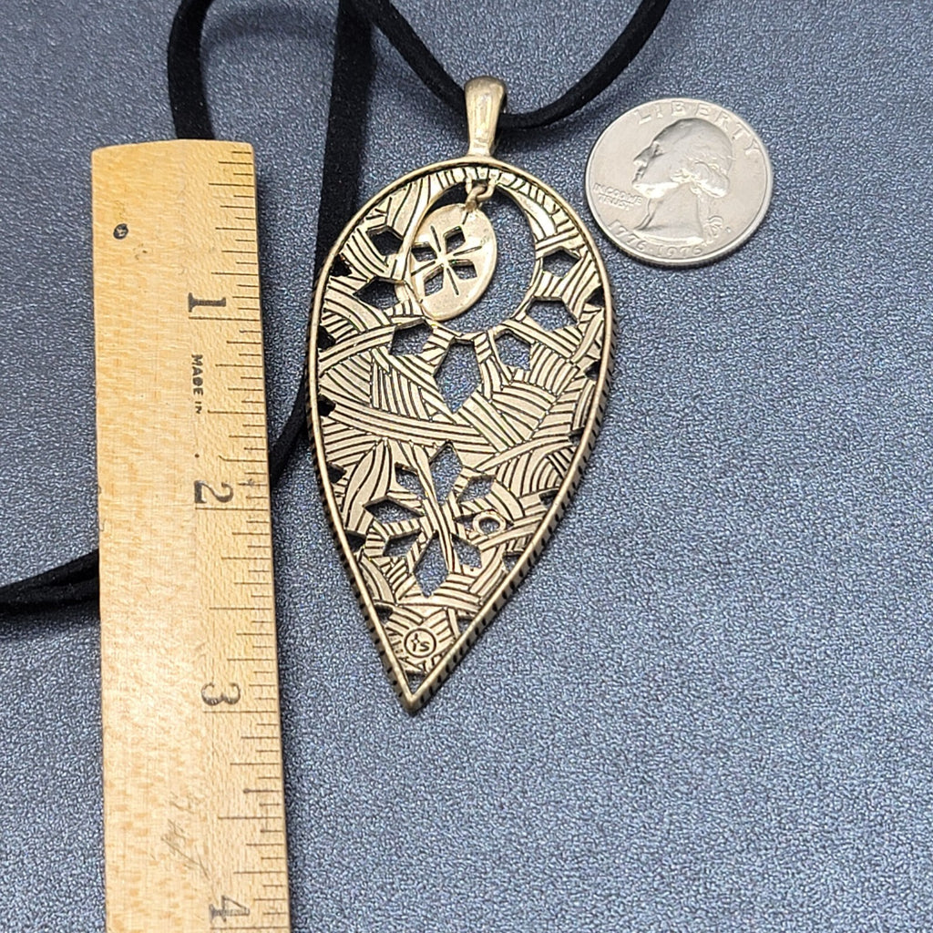 The Sak Necklace Gold tone Pendant Black Faux Leather Cord 28"