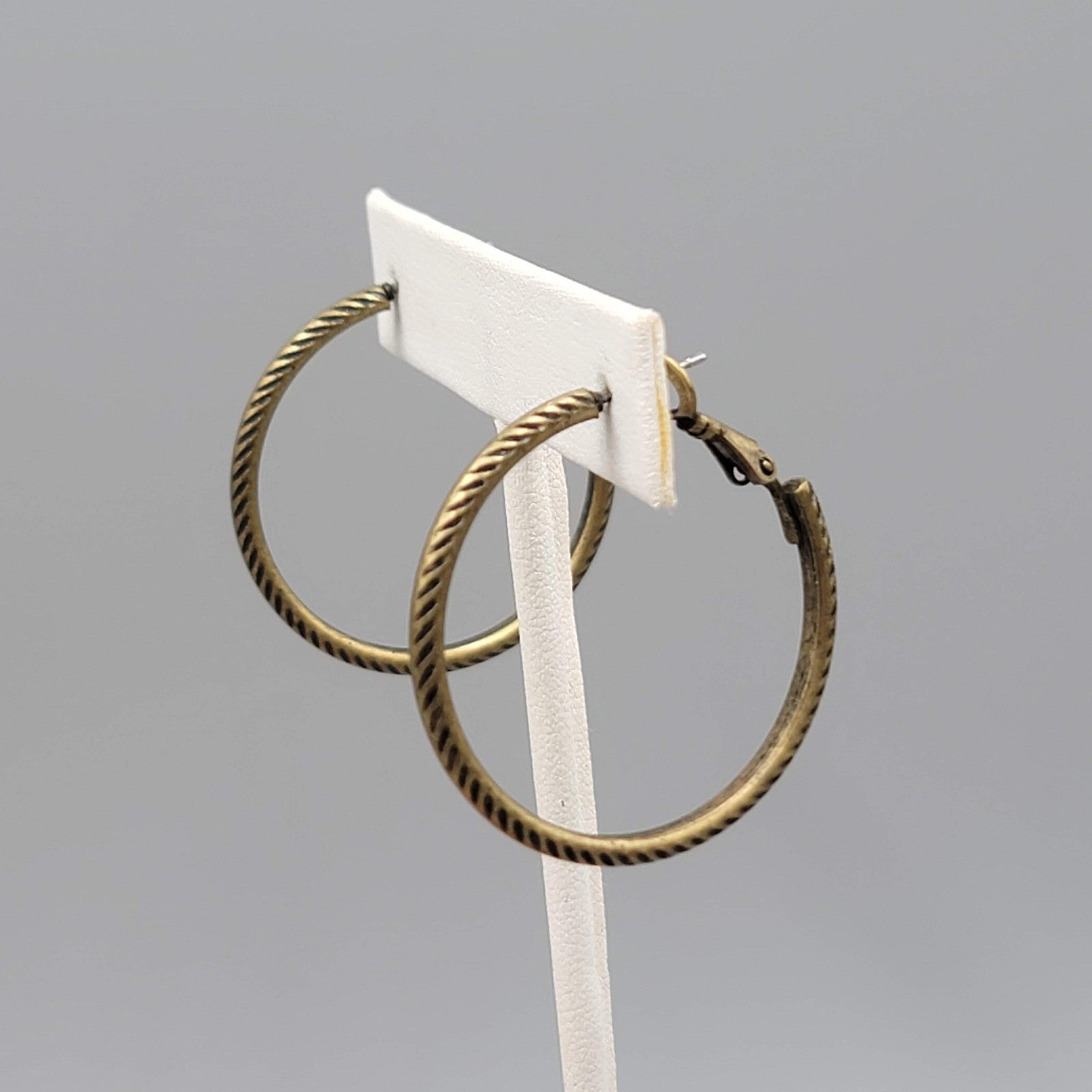 Embossed Thin Hoops Pierced Earrings Bronze tone 1.25 in