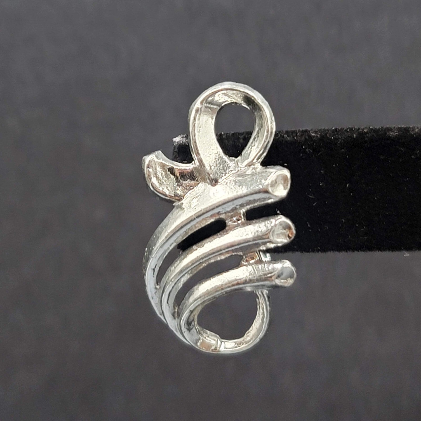 Vintage Clip on Earrings Pat Pend Silver tone Swirl Climber 1.25"