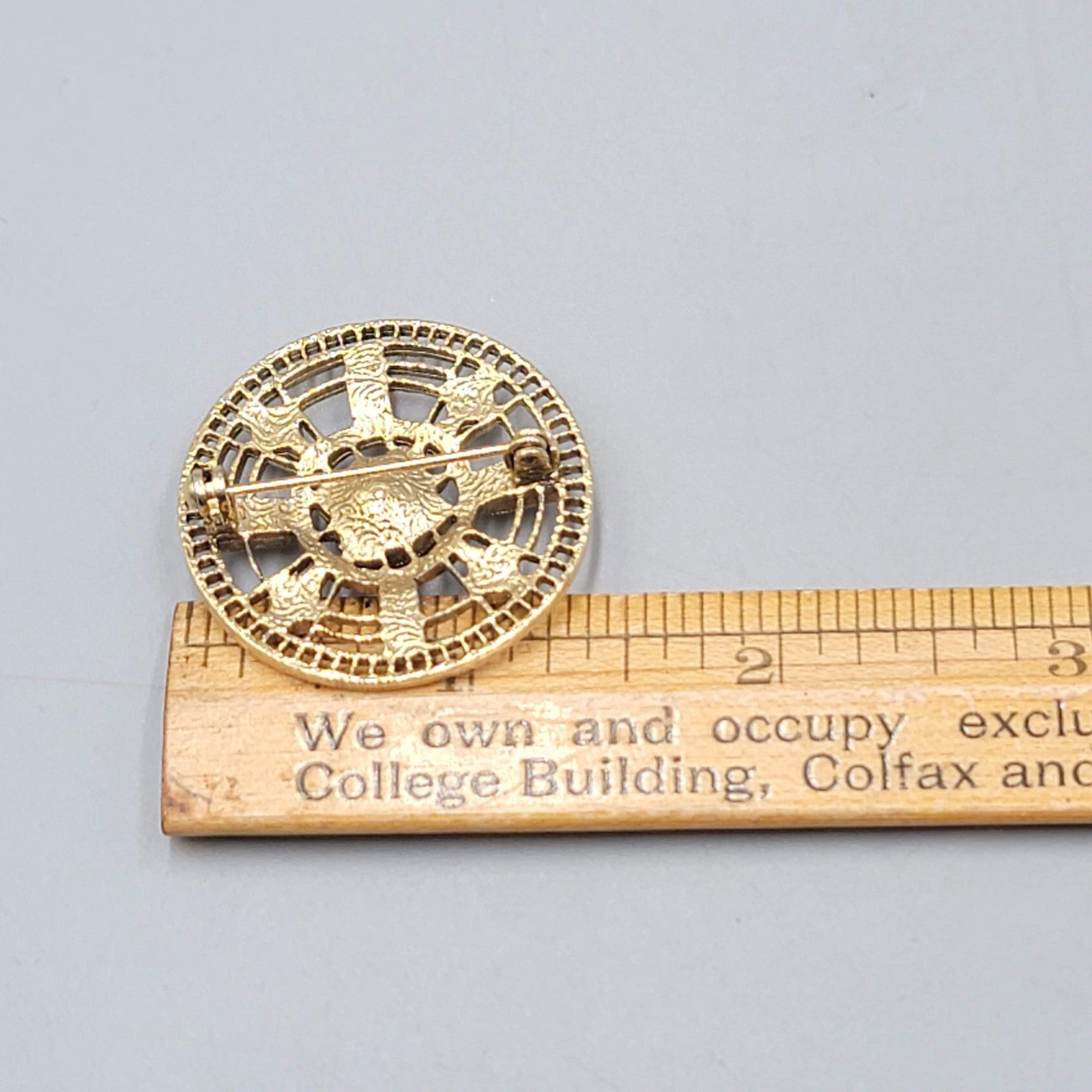 Vintage 1928 Round Open Work Brooch Gold tone Rhinestone 1 3/8 in