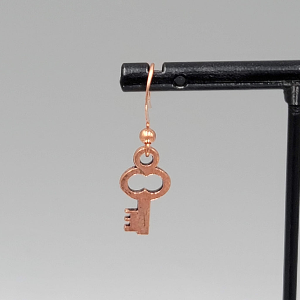 Small Copper tone Skeleton Key Pierced Earrings Dangle 5/8"