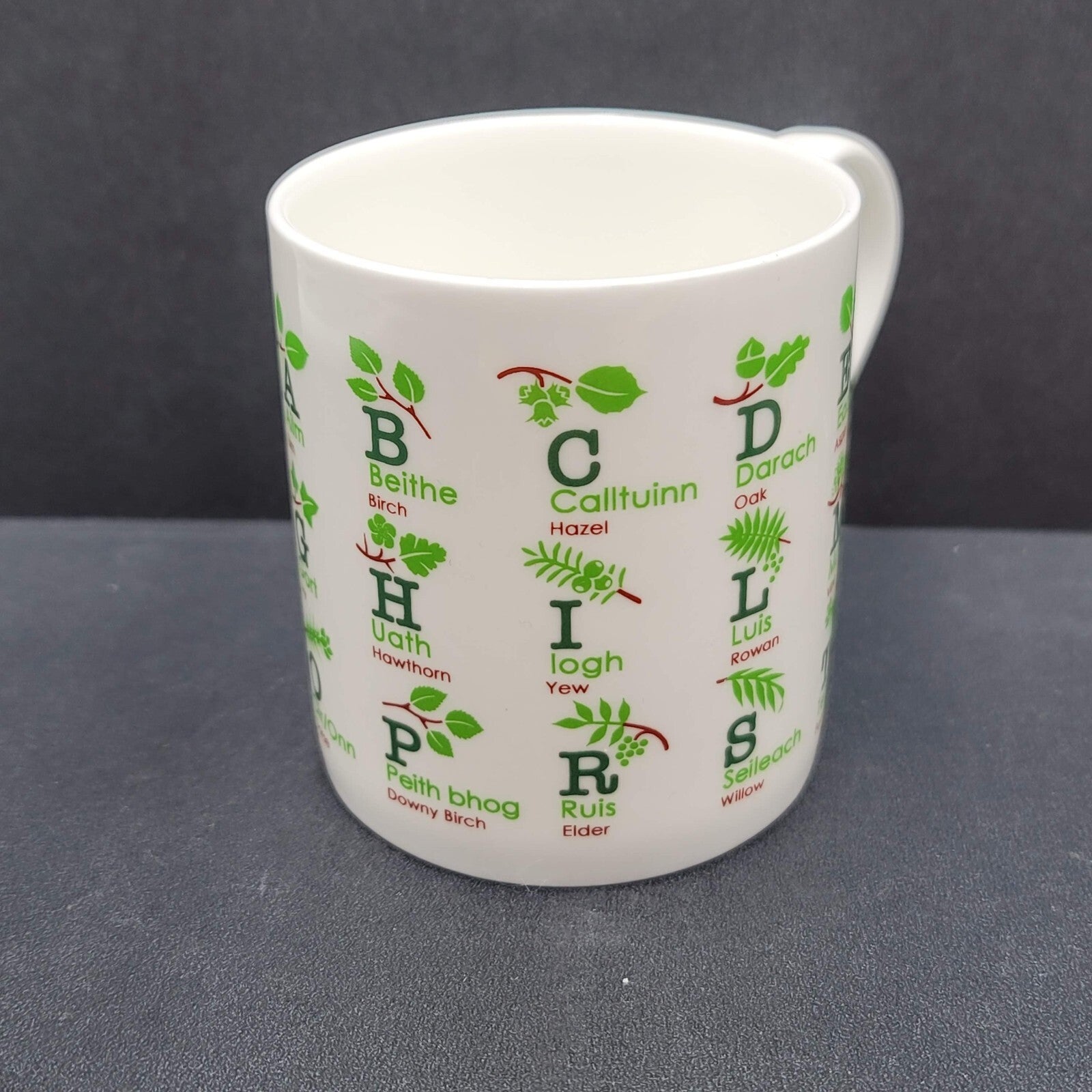 Aros Coffee Mug Cup Gaelic Alphabet Through Trees 3.25"