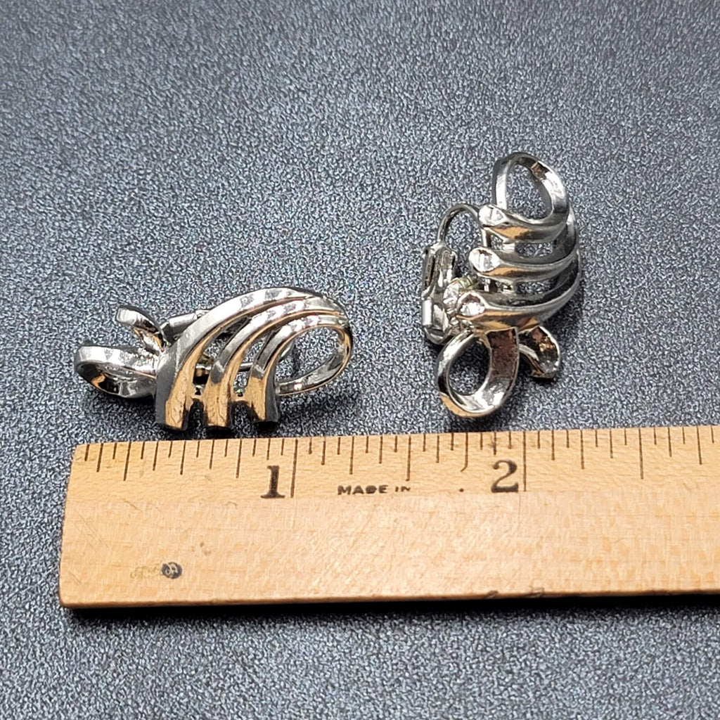 Vintage Clip on Earrings Pat Pend Silver tone Swirl Climber 1.25"