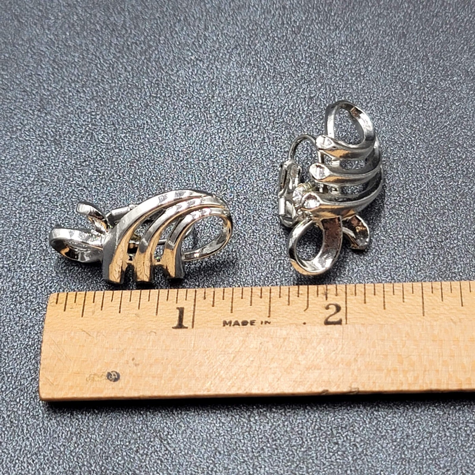 Vintage Clip on Earrings Pat Pend Silver tone Swirl Climber 1.25"