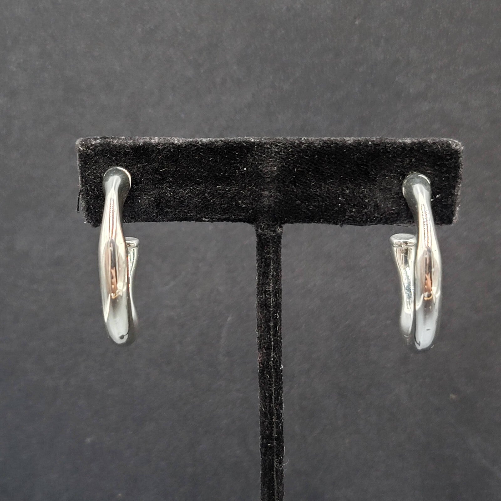 Pierced Earrings Polished Silver Plated Wavy Hoops Diamond Accent 1 1/8"