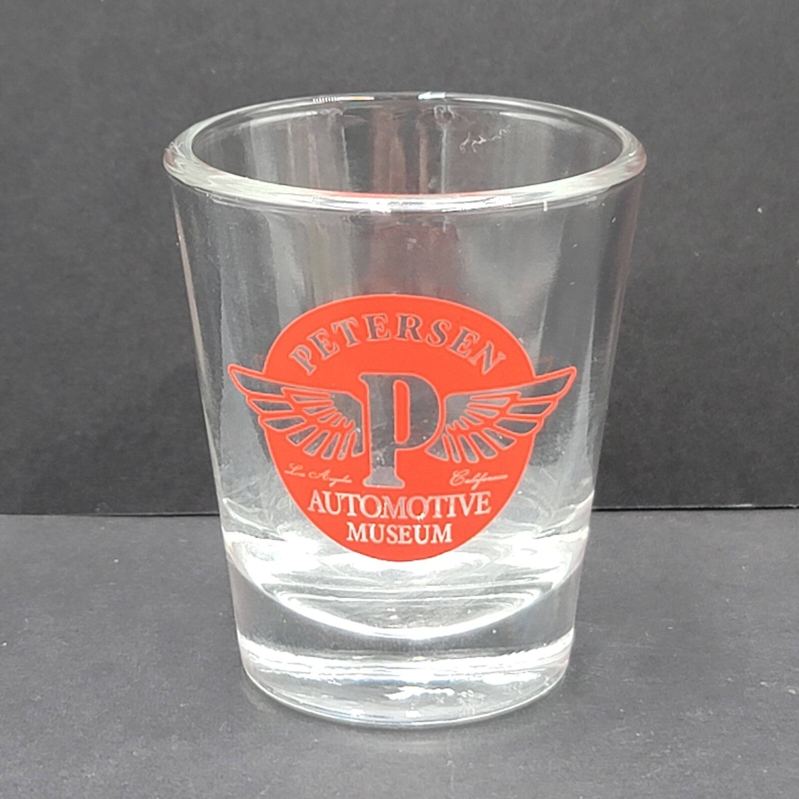 Petersen Automotive Museum Shot glass Souvenir Clear Red Lettering