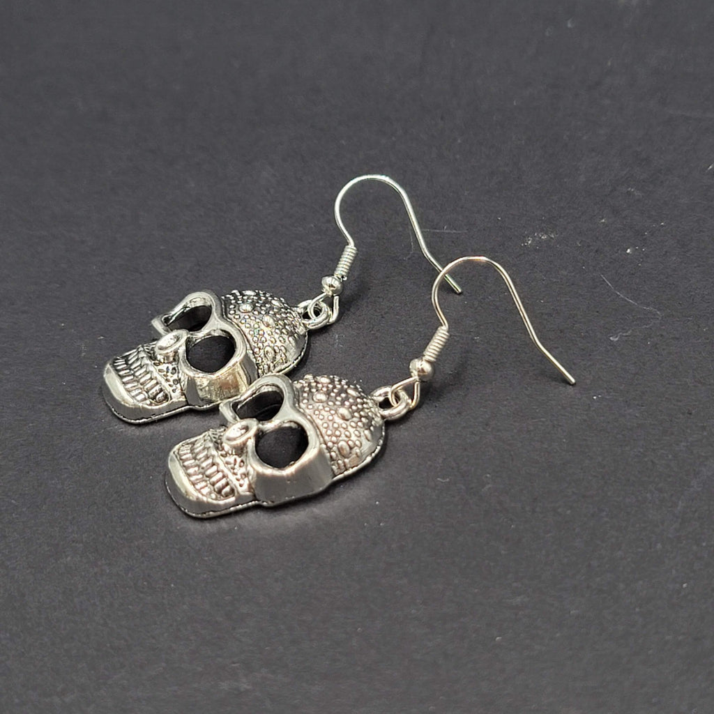 Embossed Skull Silver tone Dangle  Pierced Earrings New Halloween 1 1/8"