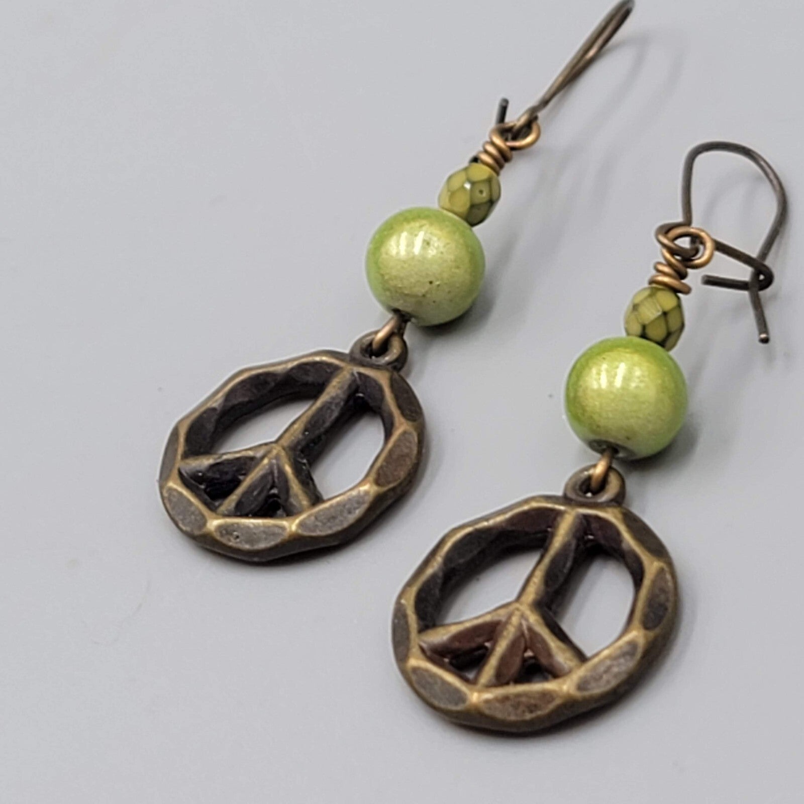 Peace Sign Pierced Earrings Bronze tone Green Bead Dangle 1.5"
