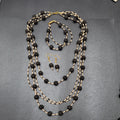 Beaded Necklace Bracelet Earrings Set Gold tone White Black Lava Bead Set