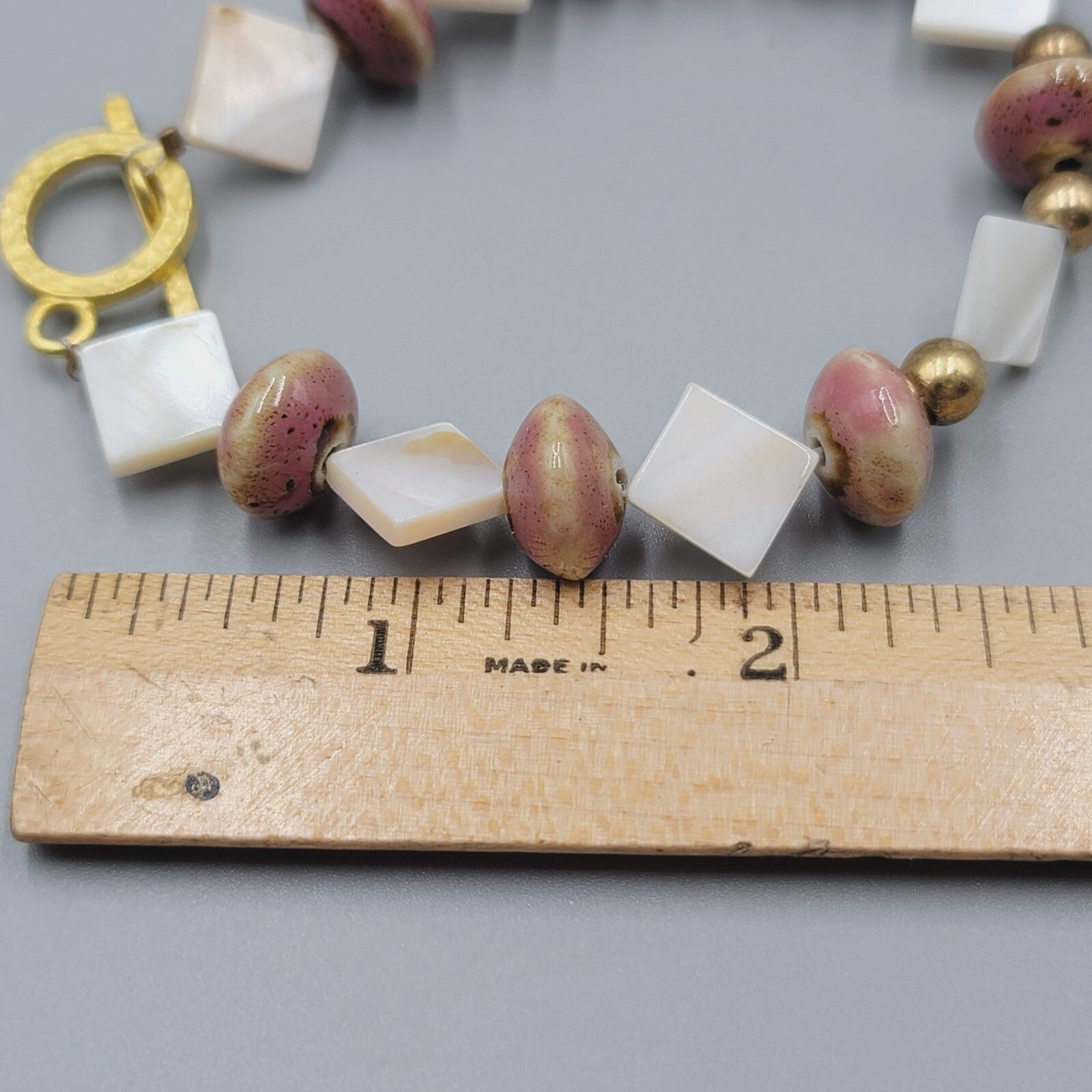 Beaded Bracelet Pottery and Mother of Pearl Beads Gold tone Toggle 6.75 in