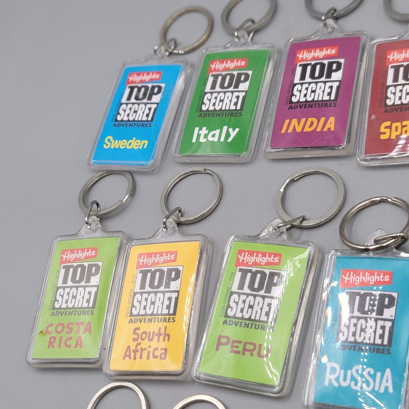 Highlights Top Secret Adventures Lot of 13 Keychains Acrylic