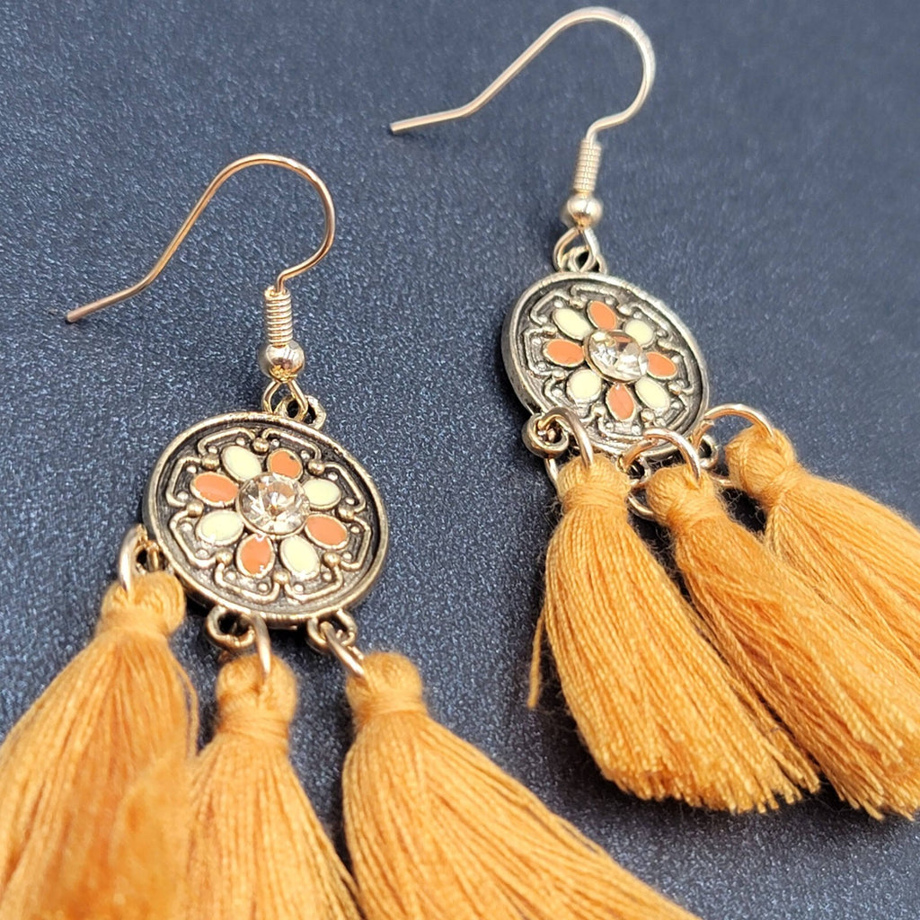 Pierced Earrings Gold tone Orange Tassel Rhinestone Medallion Dangle 1.75"