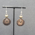 Pierced Earrings Silver tone Coconut Layered Disc Beads Dangle 1.25"