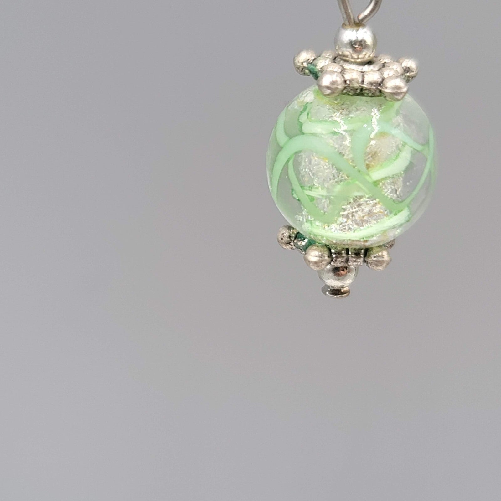 Green Swirl Glass Bead Pierced Earrings Silver tone Dangle 3/4"