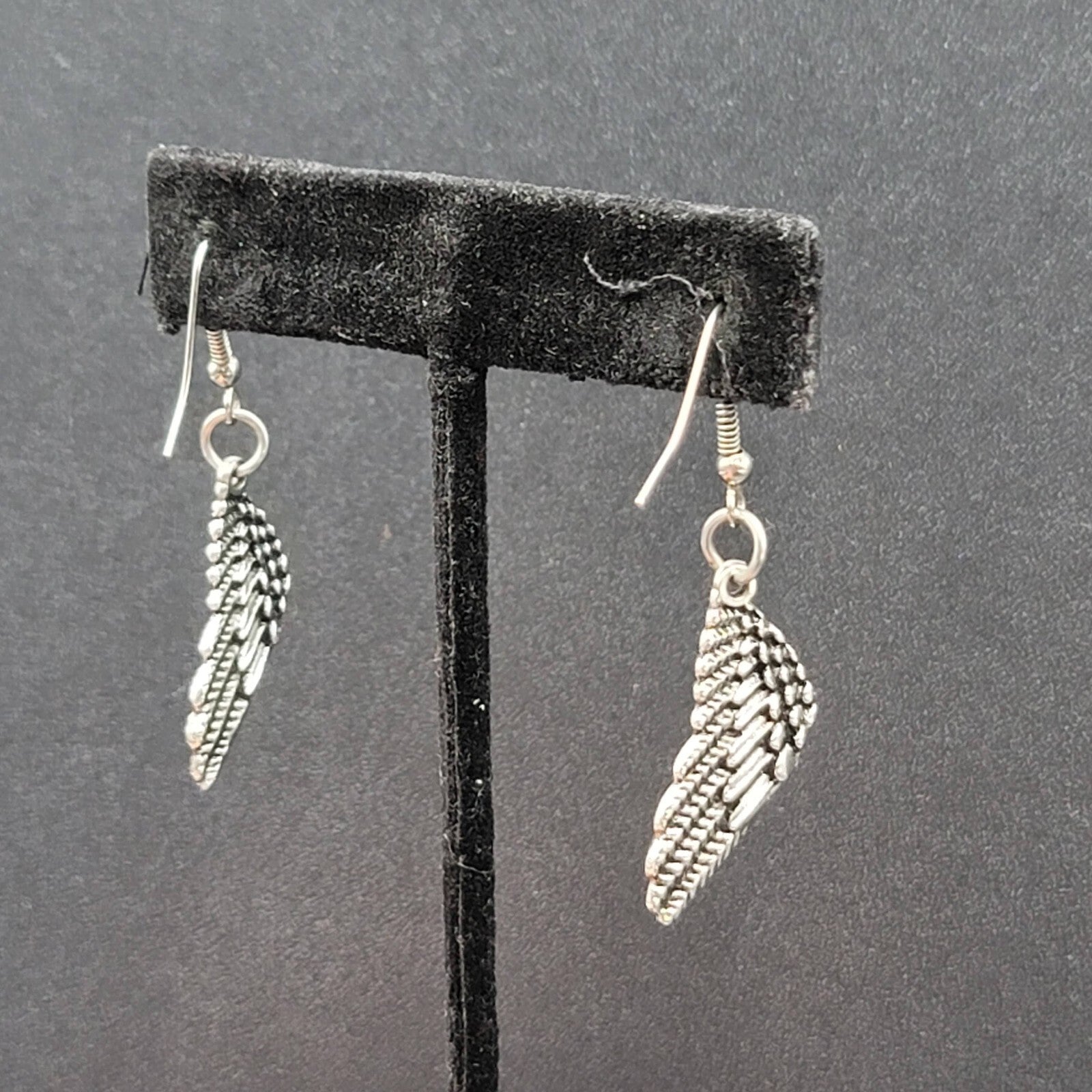 Pierced Earrings Silver tone Detailed Wings Dangle 1 1/8"