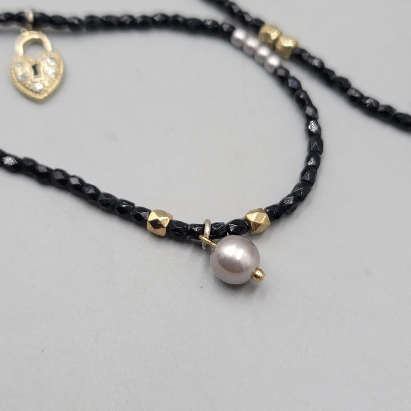 AEO American Eagle Outfitters Necklace Black Seed Bead Gold tone Charms Long 36"