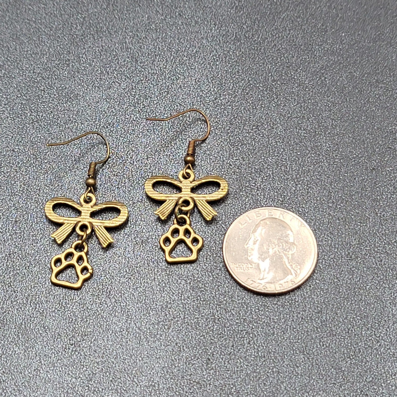Pierced Bow Dog Paws Earrings Bronze tone Dangle 7/8"