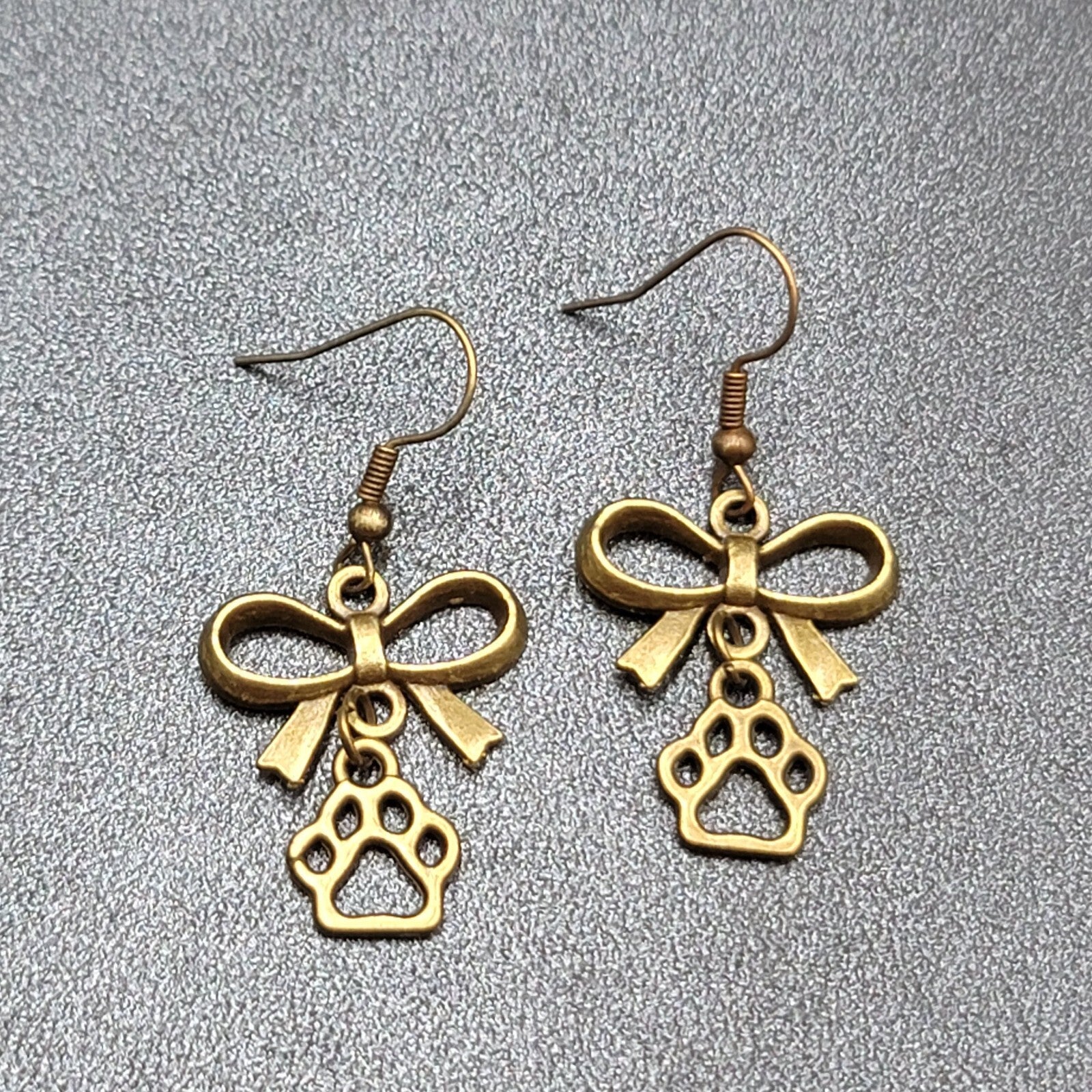 Pierced Bow Dog Paws Earrings Bronze tone Dangle 7/8"