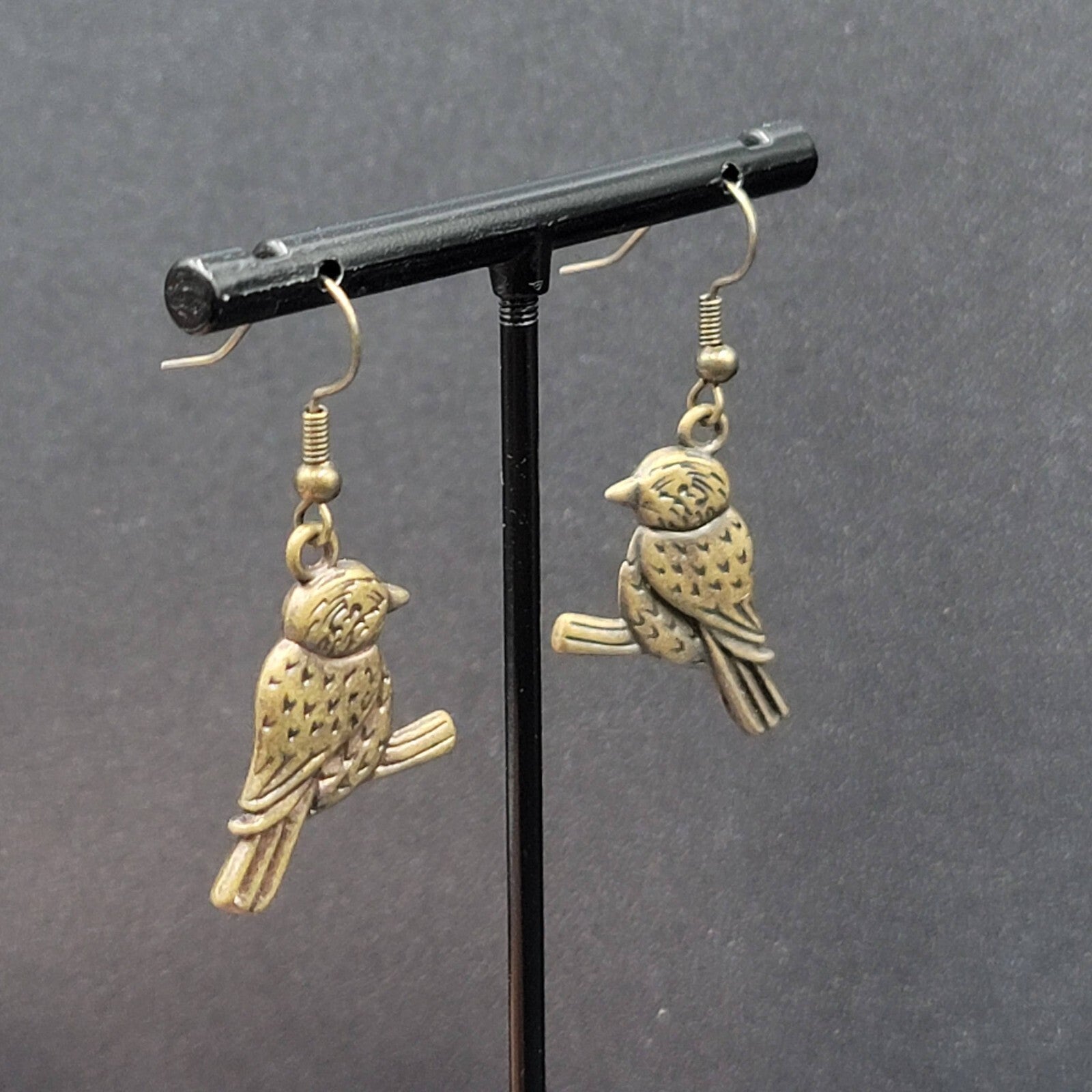 Bird on Perch Pierced Earrings Bronze tone Embossed Dangle 1"