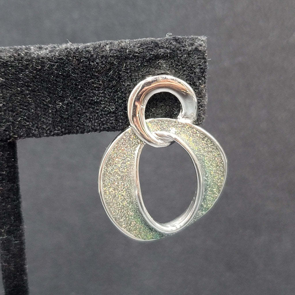 Pierced Earrings Silver tone Iridescent Glitter Interlocking Rings Drop 1 1/8"