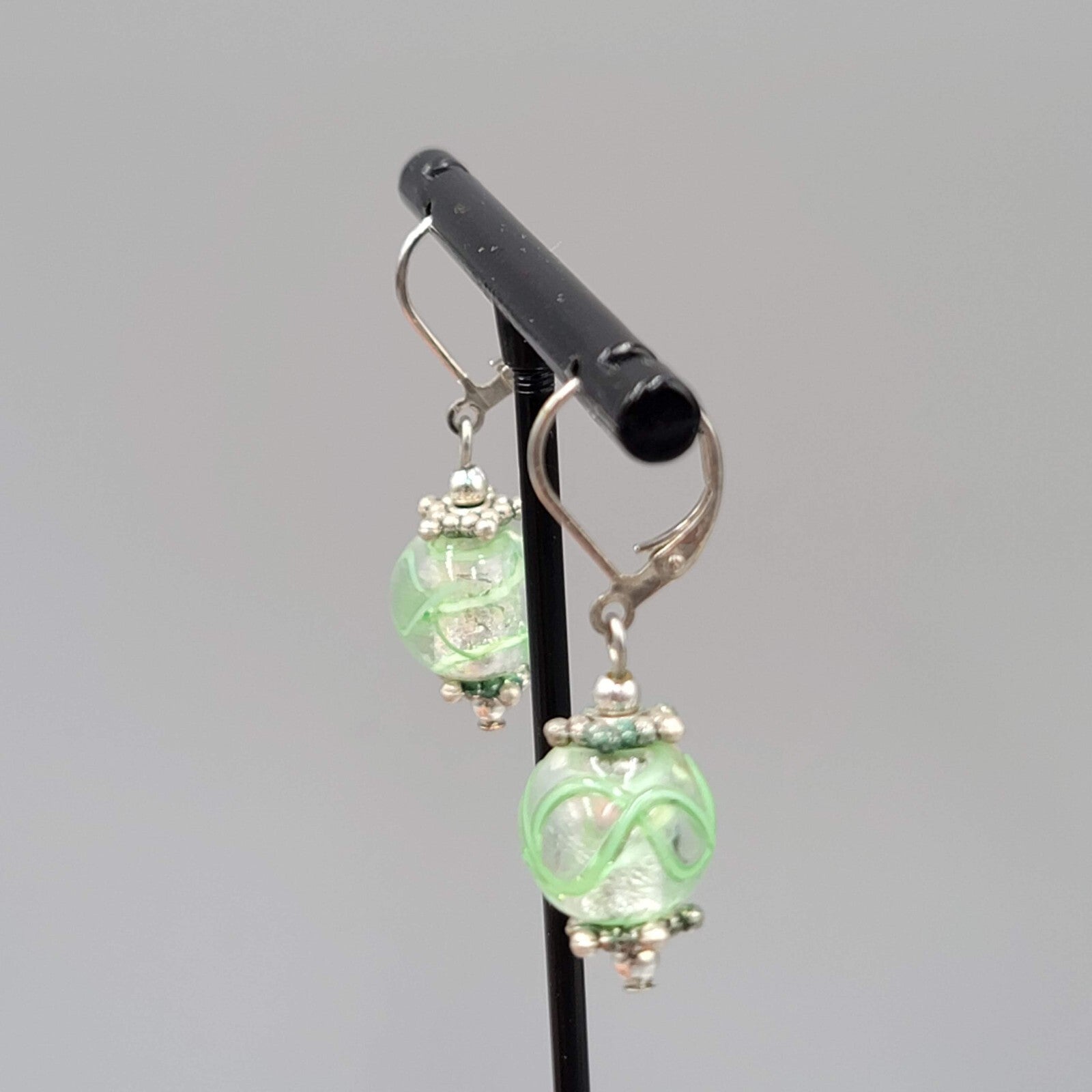 Green Swirl Glass Bead Pierced Earrings Silver tone Dangle 3/4"