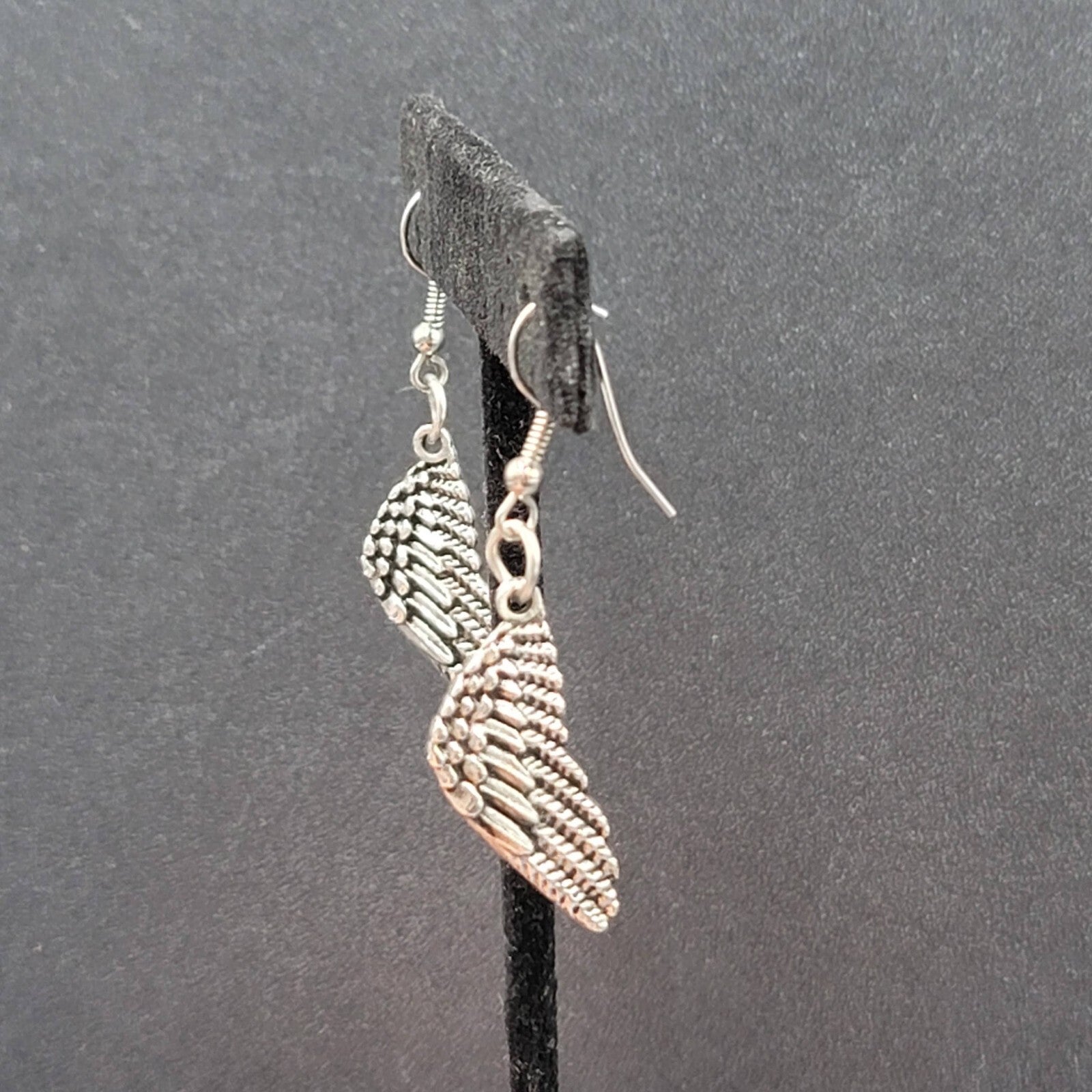 Pierced Earrings Silver tone Detailed Wings Dangle 1 1/8"