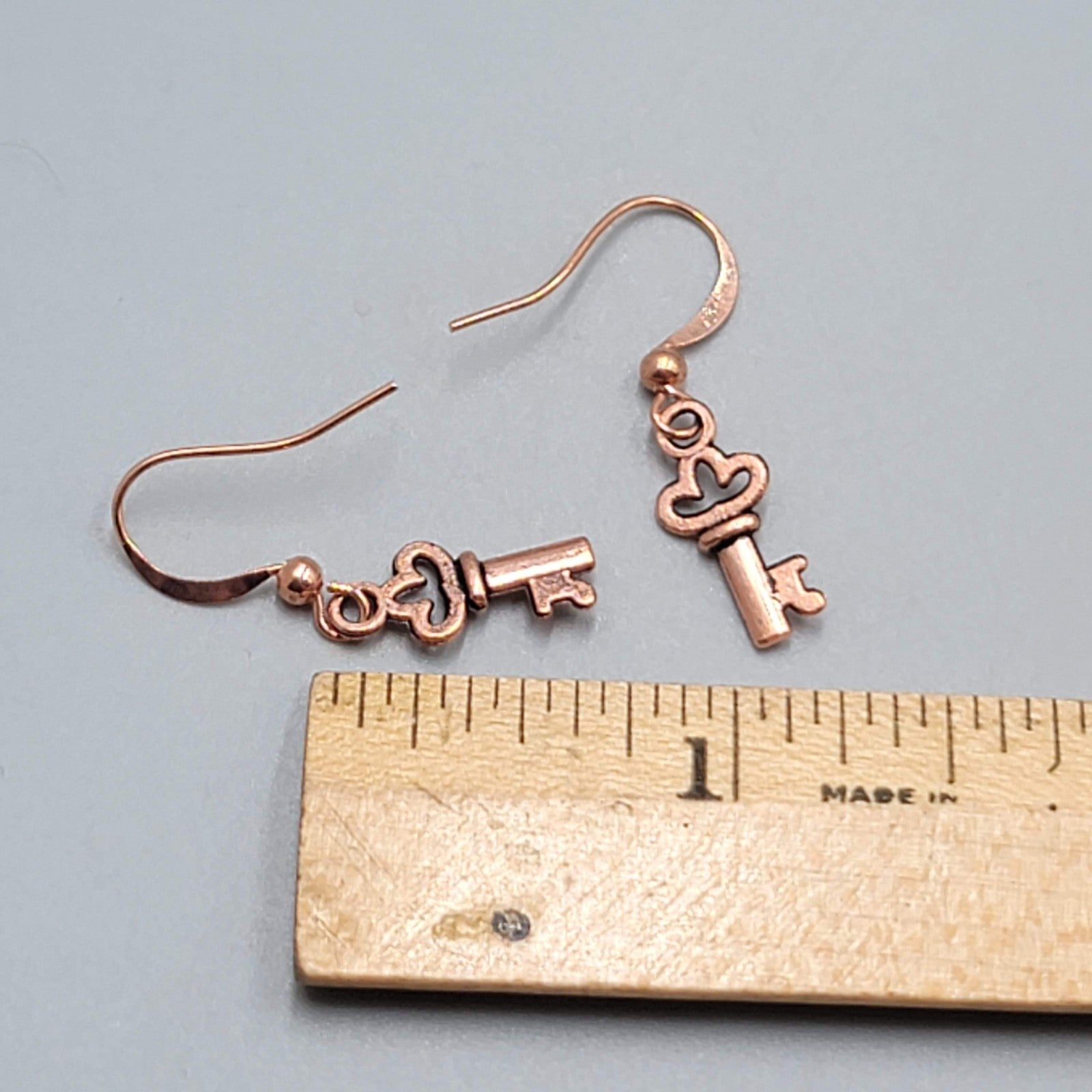 Copper tone Skeleton Key Pierced Earrings Dangle 5/8"