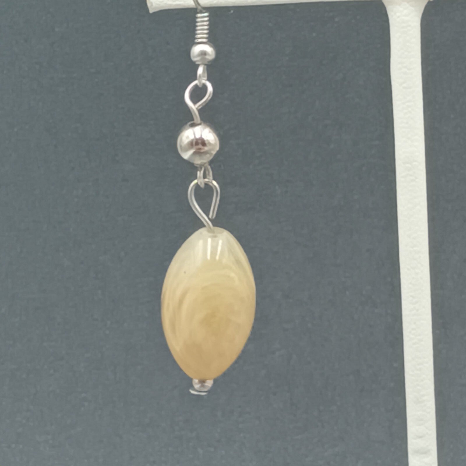 Pierced Earrings Silver tone Tan Swirl Acrylic Bead Dangle 1.5"