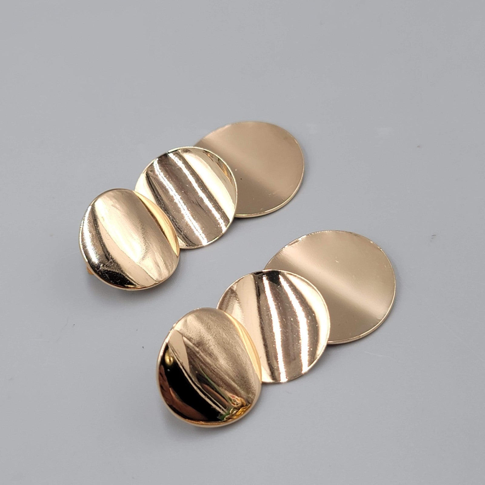 Polished Gold tone Pierced Earrings Triple Dangle Discs 2"