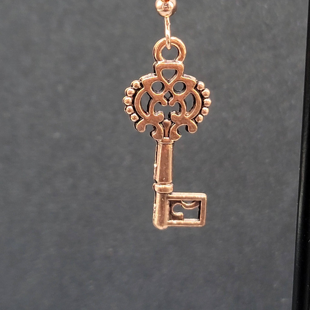 Skeleton Key Pierced Earrings Copper tone Dangle 1 1/8"