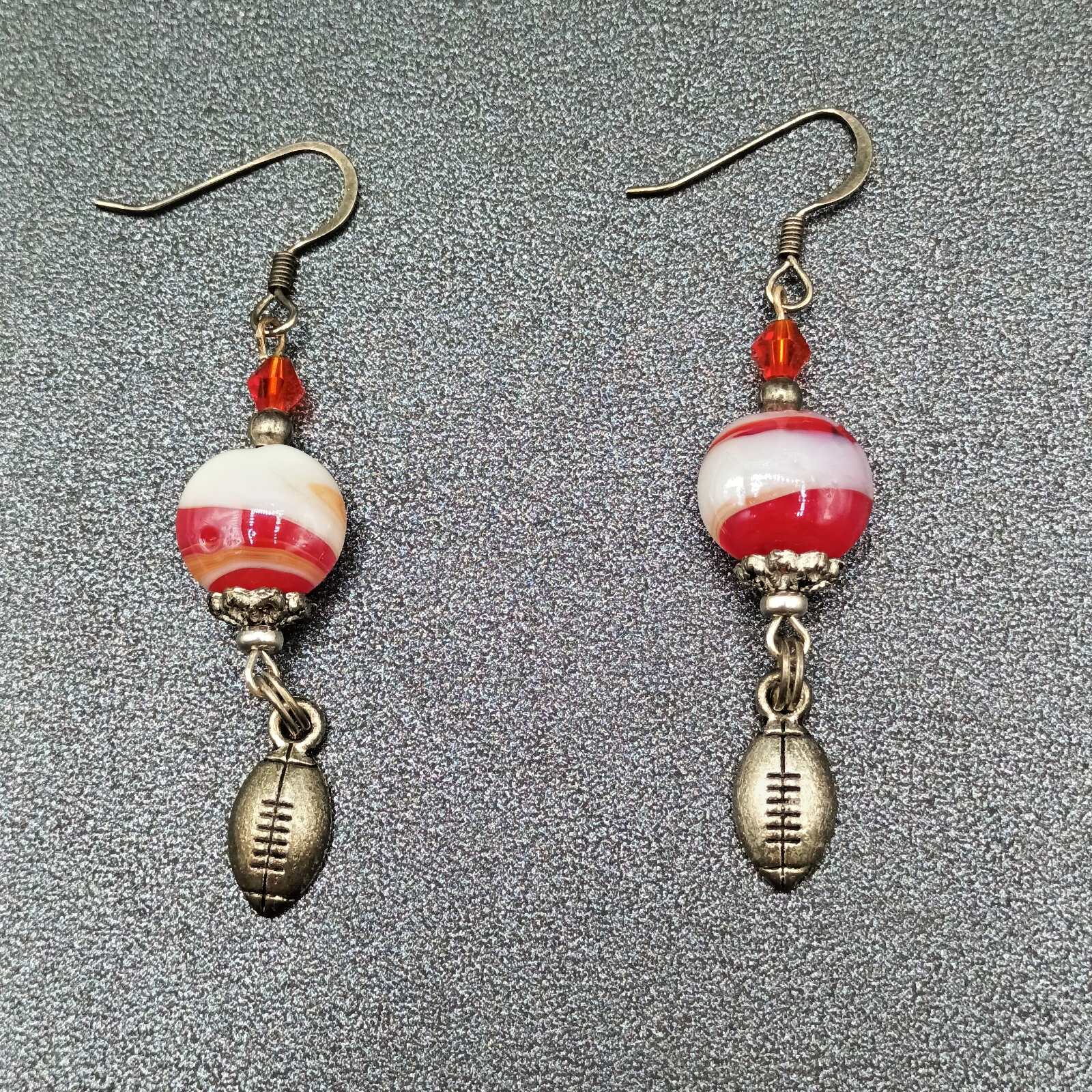 Pierced Earrings Red White Swirl Art Glass Silver tone Football Dangle Charm