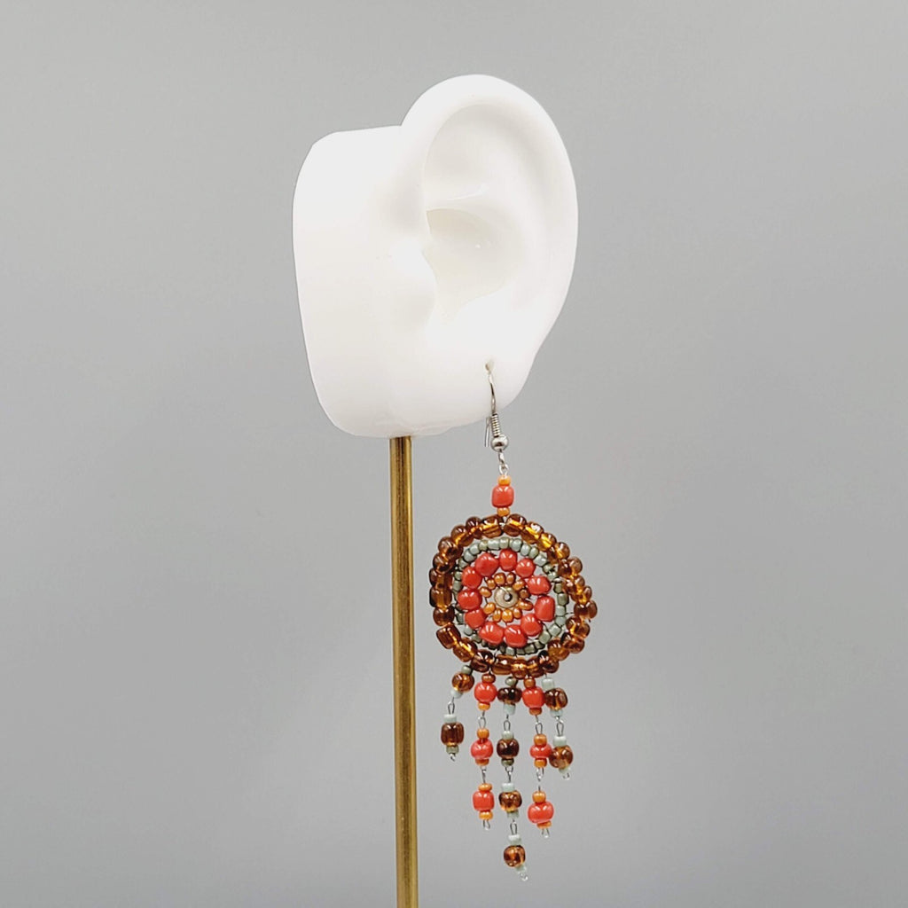 Medallion Bead Pierced Earrings Silver tone Dangle Orange Brown Blue 2.25"