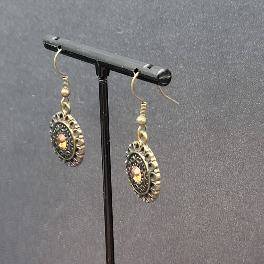 Pierced Earrings Bronze tone Orange Rhinestone Round Filigree 7/8"