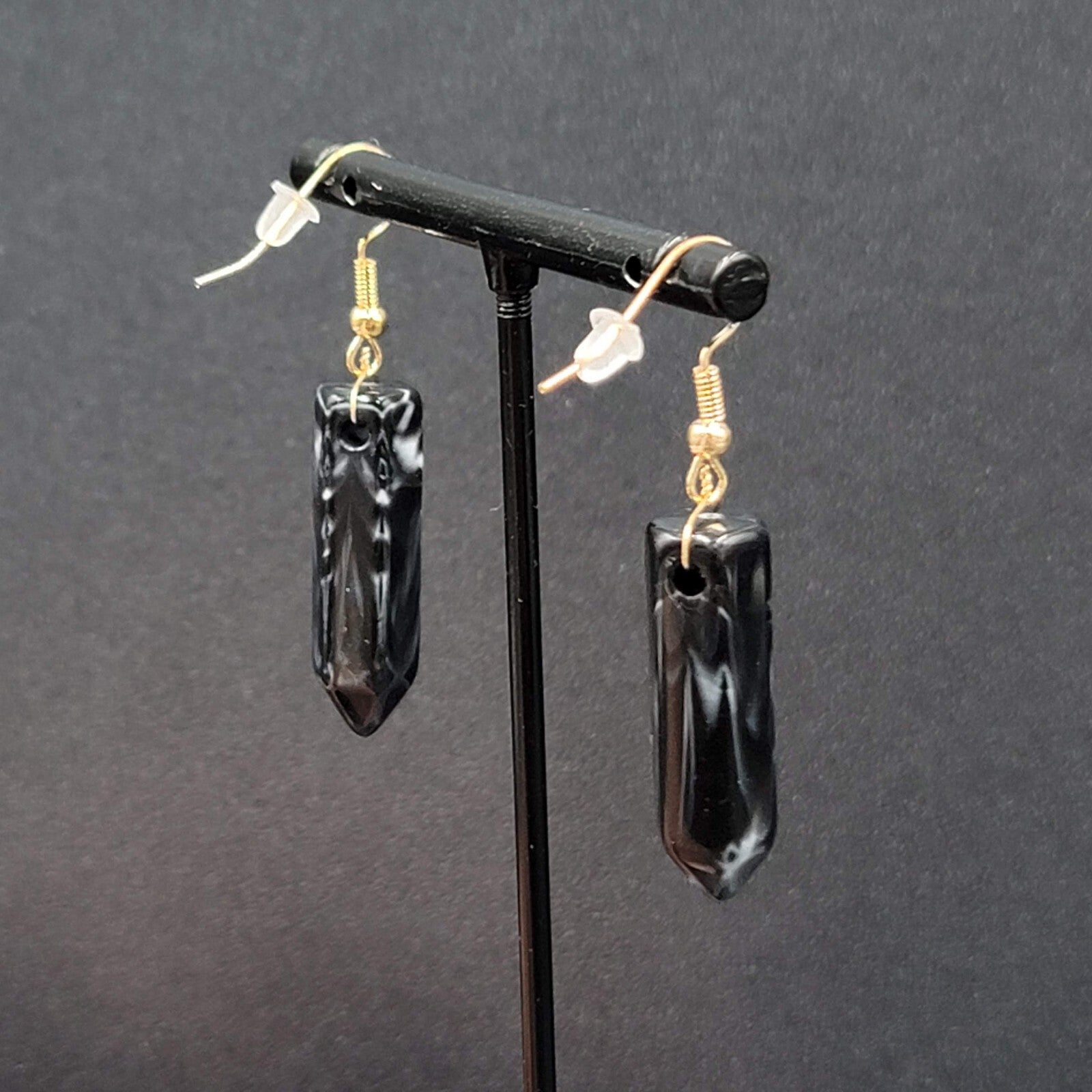 Pierced Earrings Black Marbled Resin Spike Pendulum Dangle Gold tone Hook 1.25"