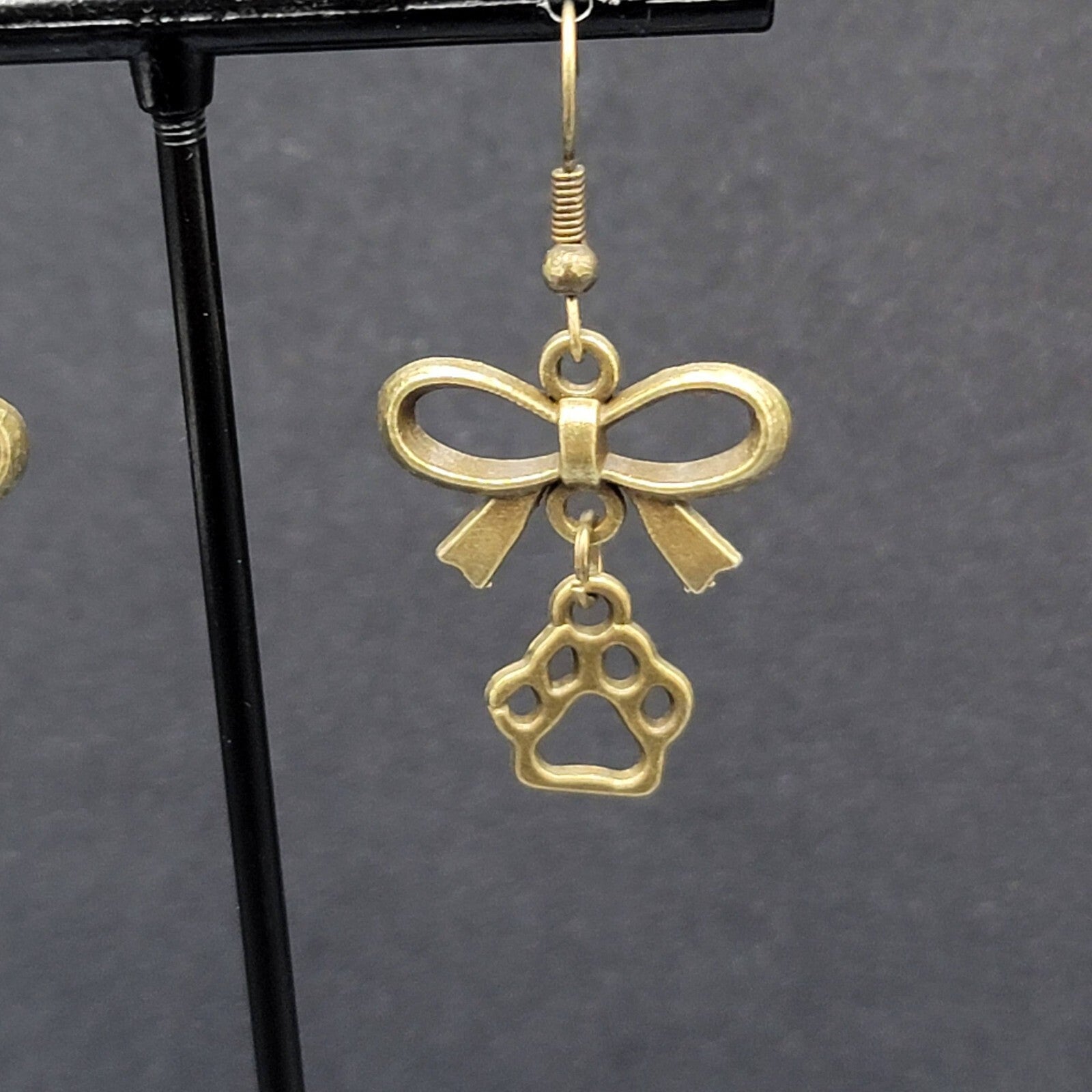 Pierced Bow Dog Paws Earrings Bronze tone Dangle 7/8"