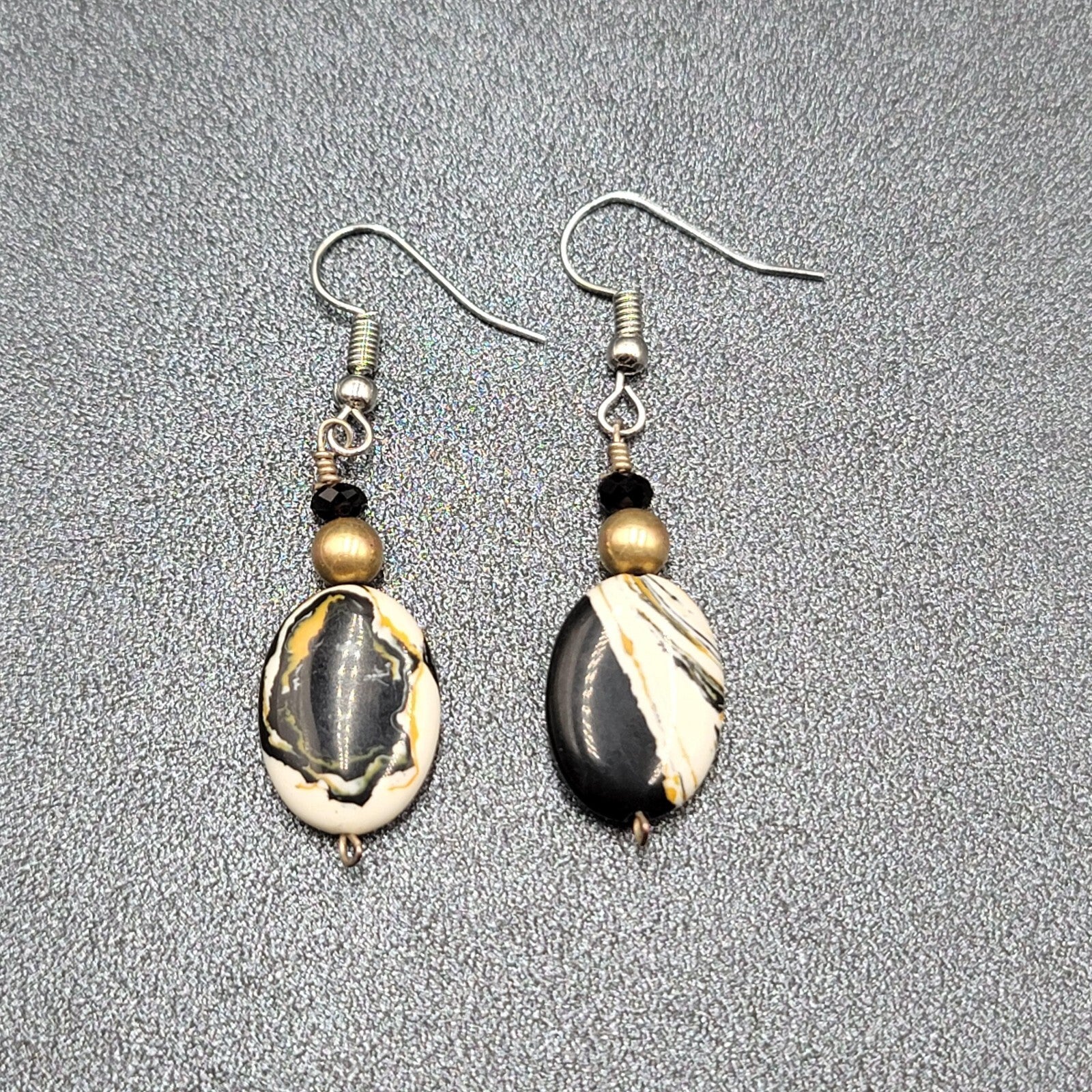 Pierced Earrings Silver tone Black White Yellow Art Glass Oval Bead Dangle 1.25"